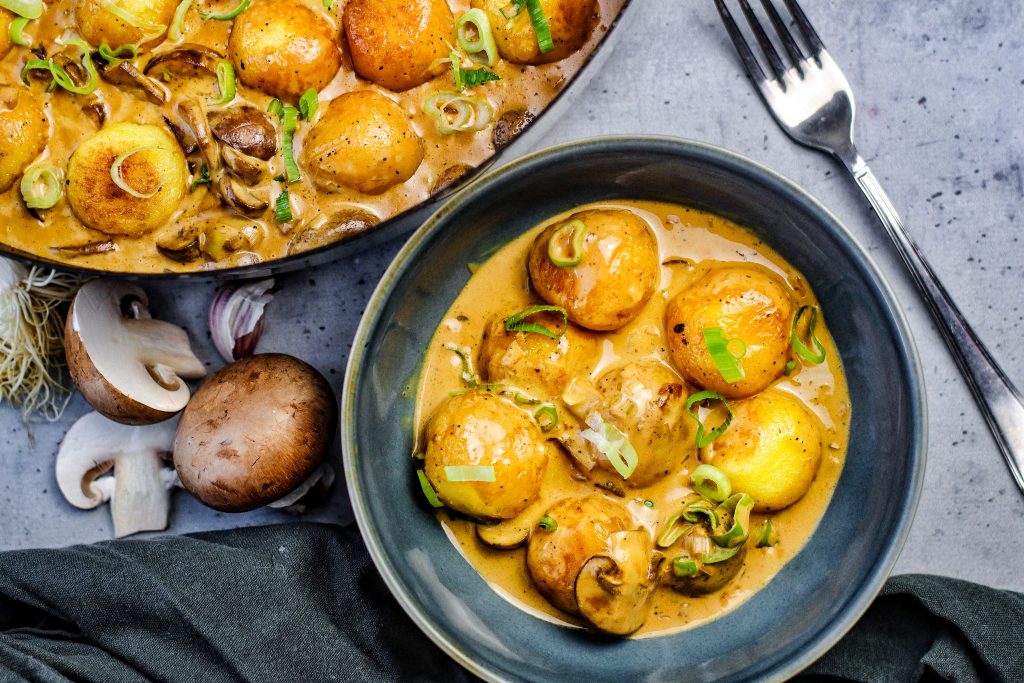 Klöße in Pilzrahmsauce